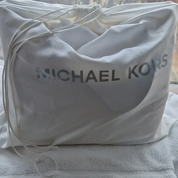 Michael Kors Shimmering  Gold Riversible Tote. - Picture 13 of 14